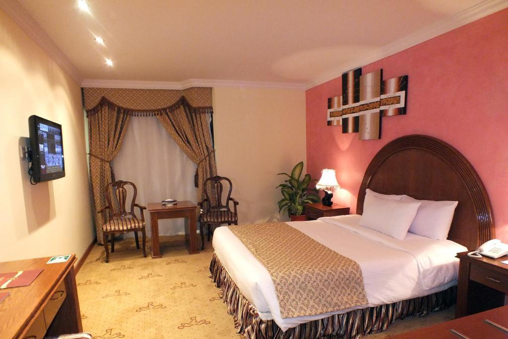 Hotel Di-Palace Rijád Pokoj fotografie